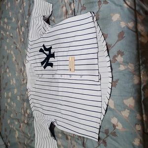 Darryl Strawberry Signed New Yankees Pinstripe Baseball Jersey.